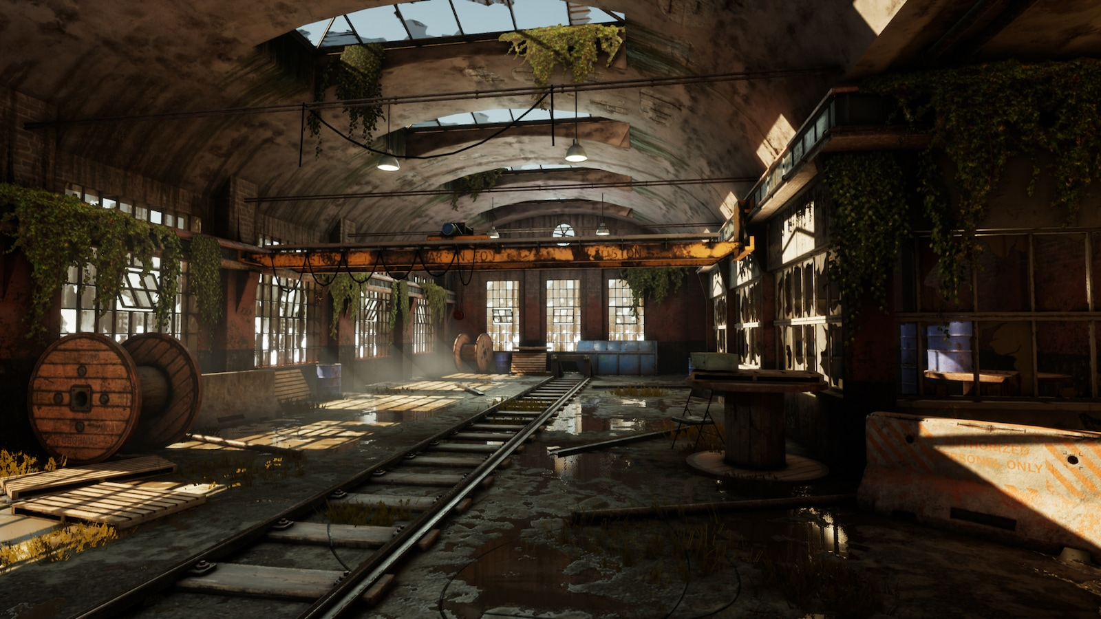 an image of an old factory, awash in browns and yellows. Large windows at the top of the walls let light fall on the dilapidated equipment.